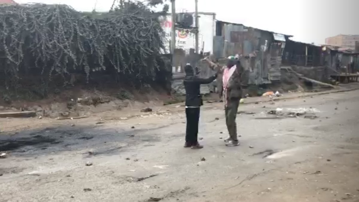 After stone throws are exchanged, attempts to deescalate tensions in Nairobi's Kibera slum